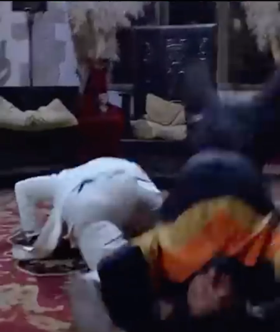 Image of Jackie Chan as Thomas fighting Benny Urquidez as Mondale Henchman in Wheels on Meals with Jackie doing a front flip to evade a head kick